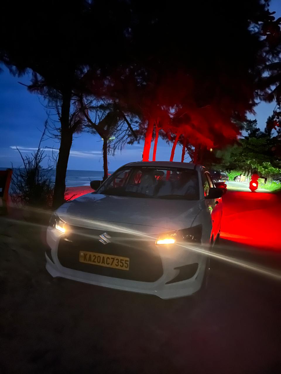 Veerabadra Travels sedan cab parked at sightseeing spot